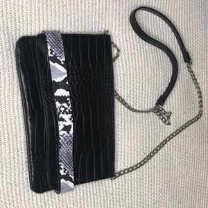 Embossed mossimo clutch